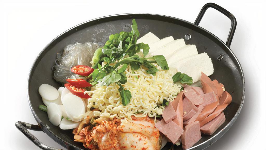 Boo Dae Jungol · Spicy assorted sausages, kimchi, noodles & vegetables casserole.