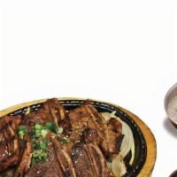 La Galbi + Side · Marinated beef short ribs with a choice of a side.