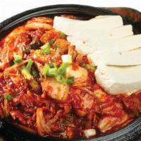 Jeyuk Tofu Kimchi · Spicy pan-fried pork and kimchi with tofu.