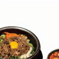 Gobdol Bibimbob Combo · Sliced beef or chicken teriyaki or spicy pork bibimbob in hot pot and the choice of a stew.
