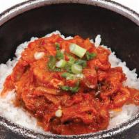 Kimchi Gobdol Bibimbob · Spicy kimchi, pork, vegetables and egg in hot pot.