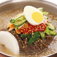 Naeng Myun · Cold buckwheat noodle and egg in beef broth.
