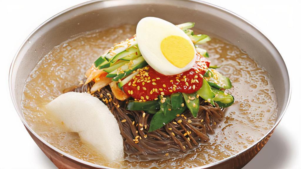Naeng Myun · Cold buckwheat noodle and egg in beef broth.