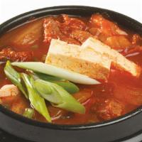 Kimchi Jigae · Most popular. Spicy kimchi and pork stew.