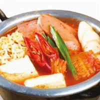 Budae Jigae · Most popular. Spicy kimchi, noodles, sausages, and tofu stew.
