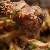 Chicken Wings & Taro Fries · deep fried wings caramelized in fish sauce and garlic. Gluten free (but prepared in same fry...