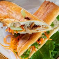 Lemongrass Chicken Banh Mi · Vietnamese sandwich on toasted French baguette with pickled carrot & daikon, cucumber, cilan...