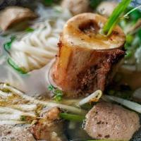 District Pho · Beef broth, rice noodles, round steak (comes rare), bone marrow, beef meatballs, garnished w...