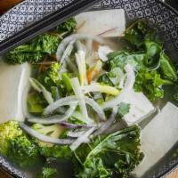Vegan Pho · Vegan broth, rice noodles, organic tofu, kale, broccoli, carrot, garnished with cilantro, sc...