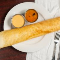 Ghee Dosa · Chef Special. Crepe made with ghee, served with lentil soup and chutneys.