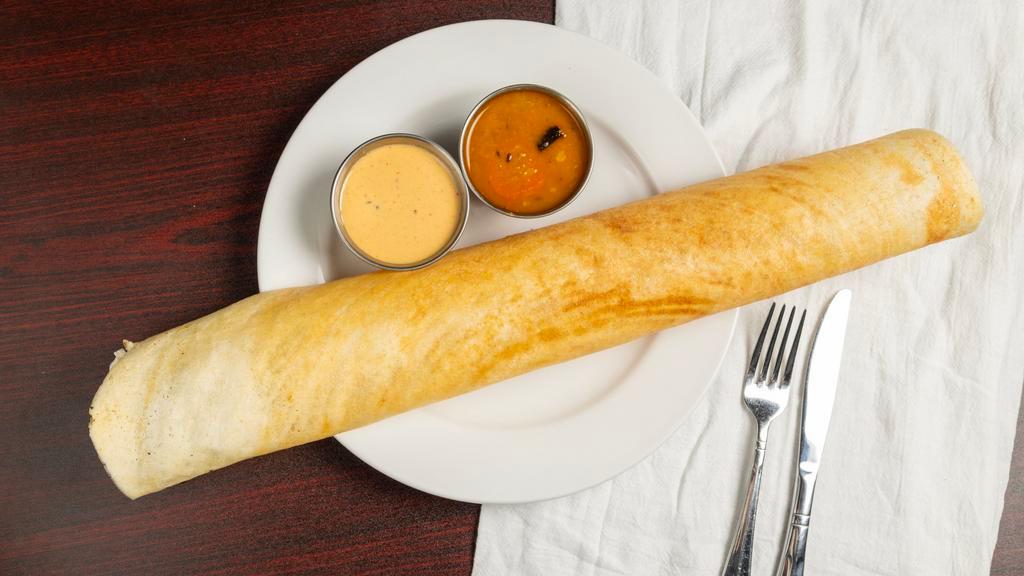 Ghee Dosa · Chef Special. Crepe made with ghee, served with lentil soup and chutneys.