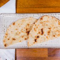 Butter Naan · It's a leavened bread made from a blend of wheat and all purpose flour.