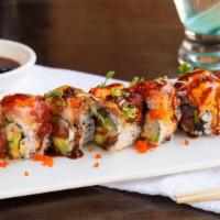 Oishi Roll · Tuna, yellowtail, salmon, avocado and asparagus, topped with torched seared tuna, salmon, sc...