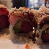 Incredible Roll · Tuna and avocado topped with tuna, salmon, eel, tobico and crunch, drizzled with sweet soy.