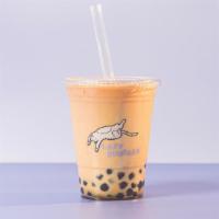 Coffee Milk Tea · Our Classic Black Milk Tea with a shot of cold brew coffee.