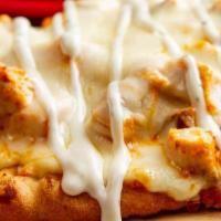 The Buffalo · Topped with our trademark buffalo chicken and mozzarella, drizzled with ranch dressing.