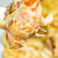 Lobster Mac N' Cheese · Sauteed lobster in a cream sauce with sharp cheddar.