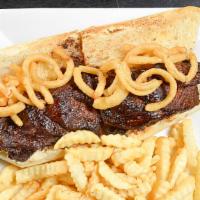 Sliced Steak Sandwich · Marinated and cooked to your liking, served with crispy frazzled onions on a toasted garlic ...