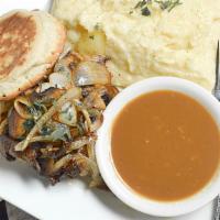 Filet Mcmuff · Marinated petite filet mignon, sautéed mushrooms, onions, and melted swiss cheese on an Engl...