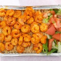 Grilled Shrimp Over Rice And Salad · With green peppers, tomatoes, onions.