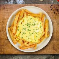Cheese On Fries · (Vegetarian) Idaho potato fries cooked until golden brown and garnished with salt and melted...