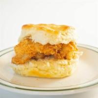 Chicken Biscuit · Two Fried Chicken Tenders on a house-made biscuit drizzled with honey.