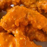 Buffalo Tenders Box · Fried Chicken Tenders tossed in our house-made Buffalo Sauce. Served with a biscuit and two ...
