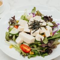 Japanese Cold Tofu Salad · Fresh green salad served with cold tofu and topped off with creamy sesame dressing.