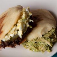 2 Signature Arepas · Choose 2 Arepas from Around the world to expand your menu experience.
Check the pictures and...