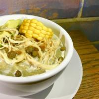 Ajiaco Soup · Traditional Soup from Bogota based on three types of potatoes, Chicken, Avocado & corn, Serv...