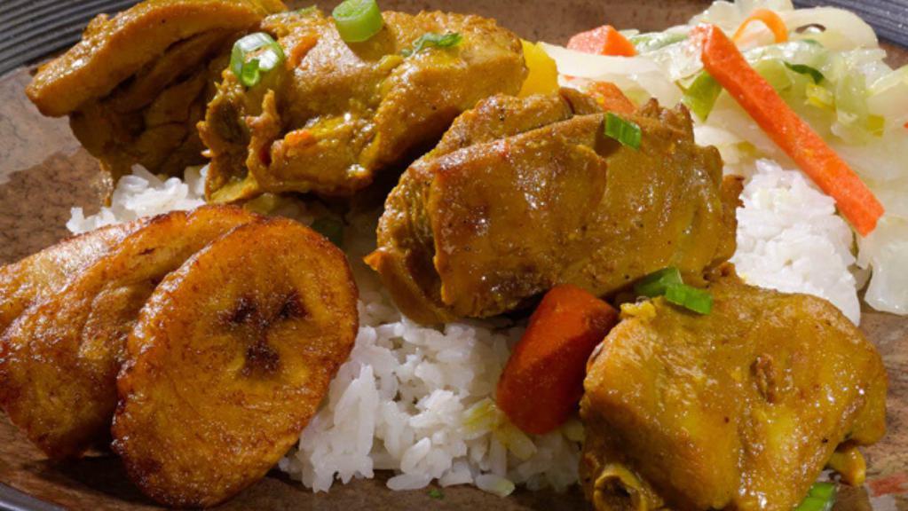 Curried Chicken Meal · Curry drenched chicken on the bone.