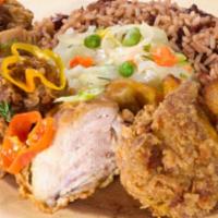 Fried Chicken · Served with rice and peas or white rice and steamed vegetables and plantains.