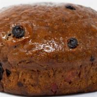 Round Bun · Using the finest ingredients, this soft, dark, sweet bread boasts a mix of fruits and raisin...
