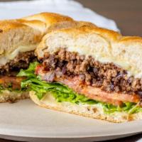 Chopped Cheese · Chopped and seared ground beef patty with sautéed onions, melted American cheese, lettuce, t...