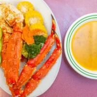 Steamed Snow Crab · 1 lb. Seasoned with Old Bay garlic butter and served with your choice of side.