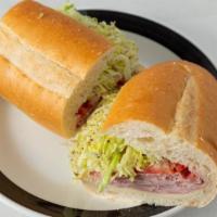 Italian Sub - Ham, Salami & Provolone · Favorite. An Italian classic on fresh baked bread loaded with all the fixin’s!.