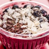 Espresso Infused Acai Bowl · Blended acai, blueberries, almond milk and espresso topped with blueberries, raw dark chocol...