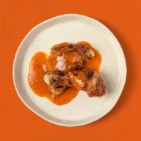 Quarter Dark Meat Chicken · Rotisserie chicken leg and thigh covered with delicious, spicy Jerk sauce.