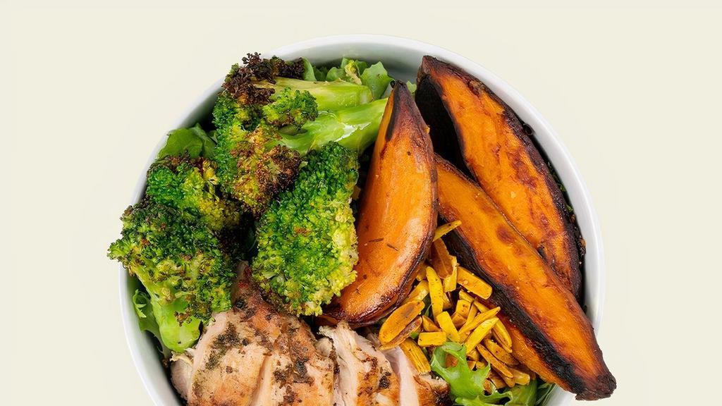Whole 30 Bowl · Roasted chicken, field greens, sweet potatoes, charred broccoli, and turmeric almonds