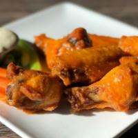 Jumbo Wings · Buffalo, bbq, toasted sesame, chipotle served with blue cheese dressing. (GF available upon ...