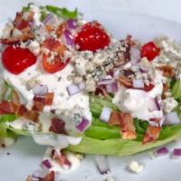 Wedge · Iceberg, tomato, red onion, smoked bacon, blue cheese crumbles, blue cheese dressing. (GF)