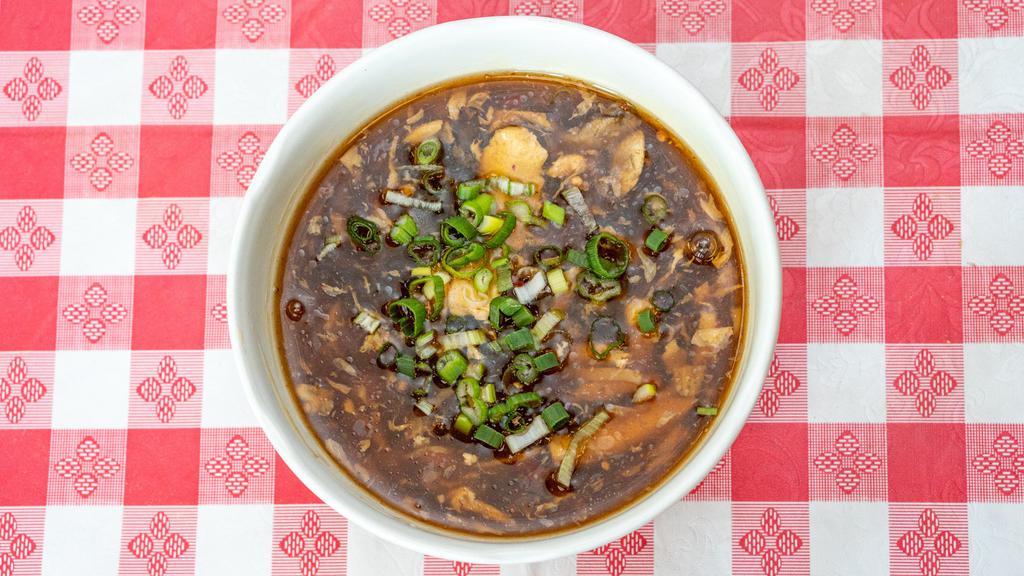 Hot And Sour Soup · Hot and spicy. Served with crispy noodles. Spicy