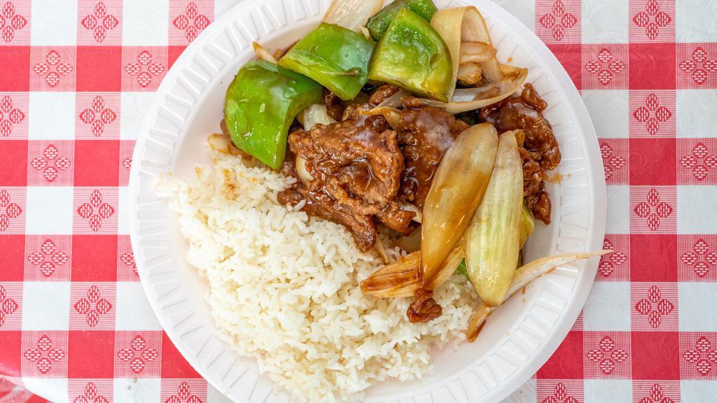 Pepper Steak With Onions · Served with white rice.