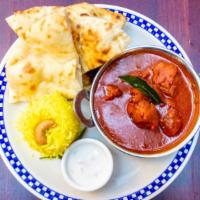 Kashmiri Rogan Josh · Cubed and braised lamb shank, seasoning spices, fennel, saffron sauce