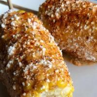 Mexican Street Corn · Roasted Corn on the cob with Chipotle Mayo and Queso Cotija and Tajin spice mix