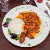 Ropa Vieja · Slow-cooked shredded black Angus flank steak in red wine tomato sauce. Served with your choi...