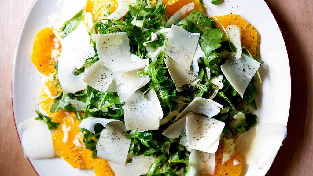 Arugula & Fennel Salad · Shaved fennel, avocado, orange wedges, avocado, green olives, cucumbers, tomatoes, Parmesan, green olive dressing