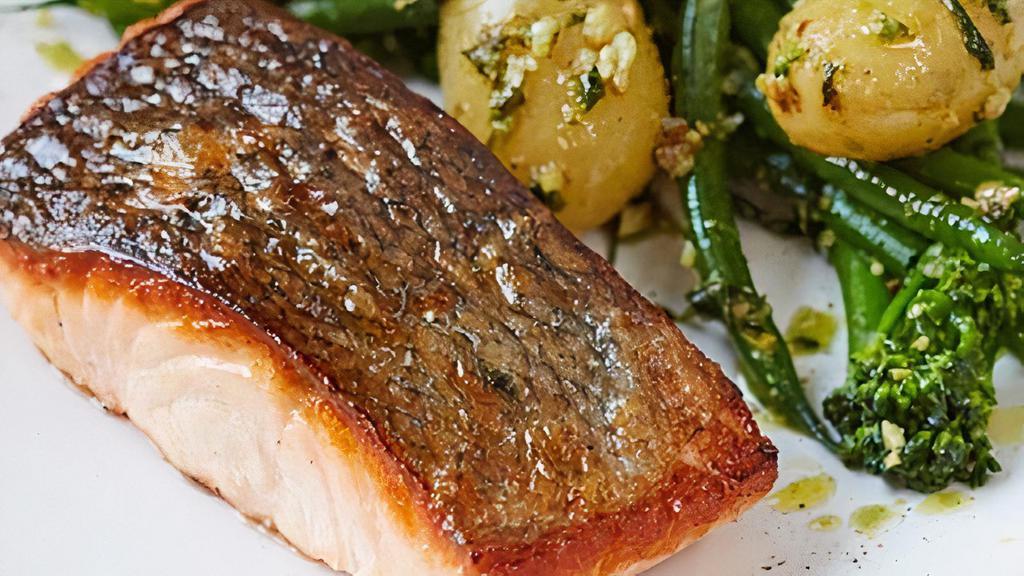 Pan Seared Atlantic Salmon · Three seasonal vegetables, quinoa, and lemon sauce.