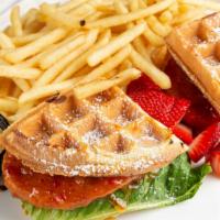 Waffle Sandwich (Kori'S) · 2 Triangle Waffle with Chicken Breast in a sweet chili sauce top with powdered sugar and Fre...