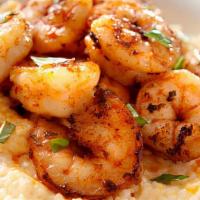 Shrimp And Grits · 4 shrimp with Grits